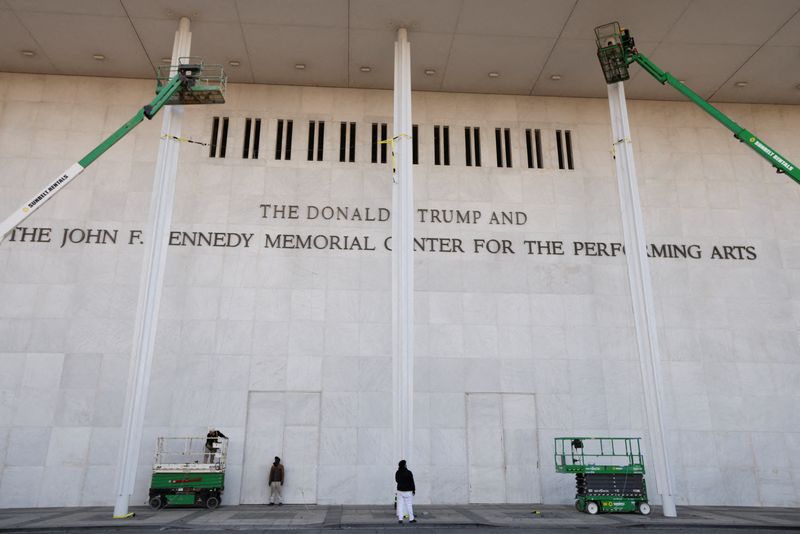 The newly added lettering for U.S. President Donald Trump's name is displayed at the facade of the John F. Kennedy Center for the Performing Arts, a day after its board announced it would rename the institution The Donald J. Trump and The John F. Kennedy Memorial Center for the Performing Arts, in Washington, D.C., U.S., December 19, 2025. REUTERS/Kevin Lamarque
