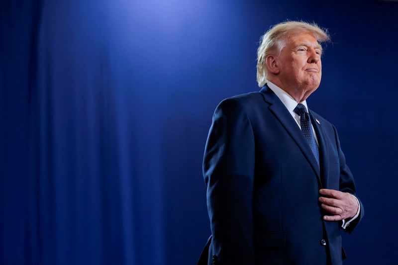 U.S. President Donald Trump stands on the stage on the day of delivering remarks at Rockland Community College in Suffern, New York, U.S., May 22, 2026. REUTERS/Kylie Cooper