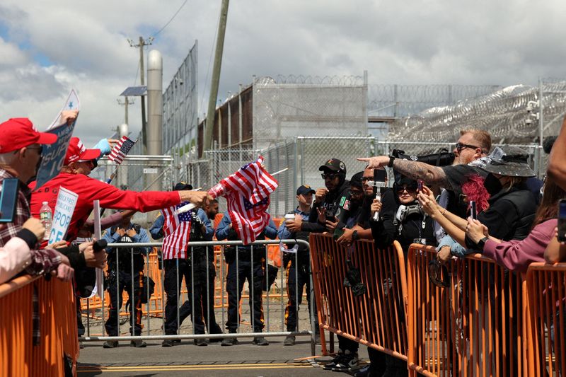Barriers separate anti-U.S. Immigration and Customs Enforcement (ICE) protesters from pro-ICE demonstrators, as State Police stand watch, outside the Delaney Hall detention centre, in Newark, New Jersey, U.S., May 30, 2026. REUTERS/Caitlin Ochs
