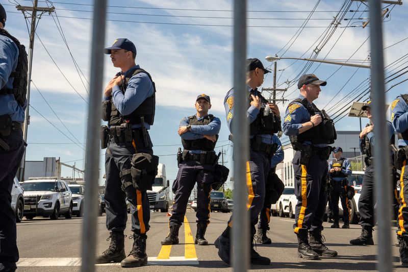 New Jersey State Police officers stand guard at a road block leading to Delaney Hall, in Newark, New Jersey, U.S., May 31, 2026. REUTERS/David 'Dee' Delgado