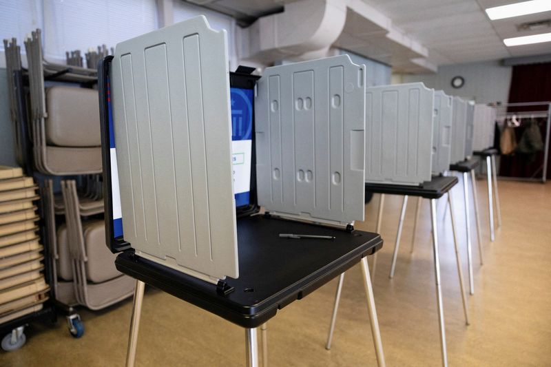 FILE PHOTO: Voting booths are pictured in a polling location as the Democratic and Republican parties hold primary elections in Dayton, Ohio, U.S. March 19, 2024.  REUTERS/Megan Jelinger/File Photo