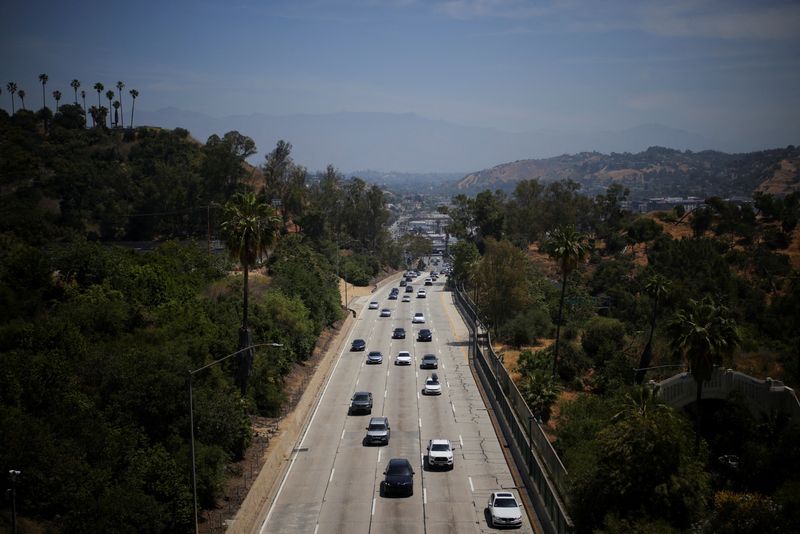 FILE PHOTO: Cars drive along the 110 Freeway in Los Angeles, California, U.S., May 22, 2025. REUTERS/Daniel Cole/File Photo