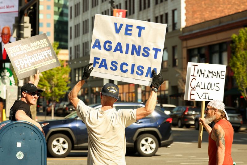 Protestors gather outside the Upstate New York ICE headquarters, also known as the Delaware North Building, in Buffalo, New York, U.S., May 19, 2026.  REUTERS/Lindsay DeDario