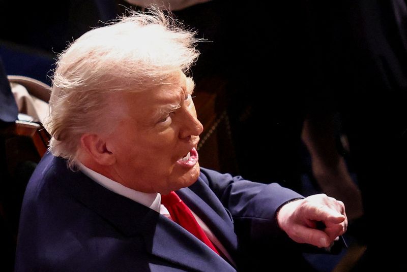U.S. President Donald Trump arrives to deliver the State of the Union address to a joint session of Congress in the House Chamber at the U.S. Capitol in Washington, D.C., U.S., February 24, 2026.  REUTERS/KEVIN LAMARQUE