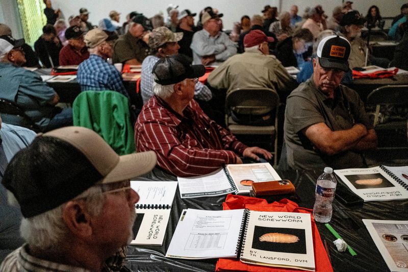 FILE PHOTO: Cattle ranchers attend a presentation on the threat of the New World Screwworm during the Fayette County Cow/Calf Clinic and Trade Show in La Grange, Texas, U.S., May 1, 2026.  REUTERS/Joel Angel Juarez/File Photo