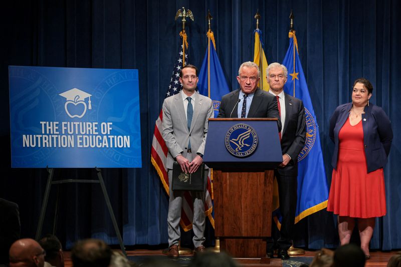U.S. Secretary of Health and Human Services (HHS) Robert F. Kennedy Jr., standing next to Under Secretary of Education Nicholas Kent, Center for Medicare & Medicaid Services (CMS) Administrator Dr. Mehmet Oz, and Vice Chancellor for Research at the University of Tennessee Health Sciences Center Dr. Jessica Snowden, speaks during an event about nutrition education, at the U.S. Department of Heath and Human Services in Washington, D.C., U.S., June 8, 2026. REUTERS/Kylie Cooper