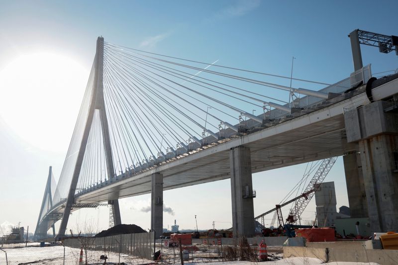 FILE PHOTO: The Gordie Howe International Bridge linking Detroit to Windsor Ontario Canada is under construction in Detroit, Michigan, U.S. February 10, 2026.  REUTERS/Rebecca Cook/File Photo