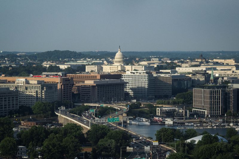 An aerial view, taken through the window of an airplane, of the U.S. Capitol building in Washington, D.C., U.S., June 11, 2026. REUTERS/Graeme Sloan
