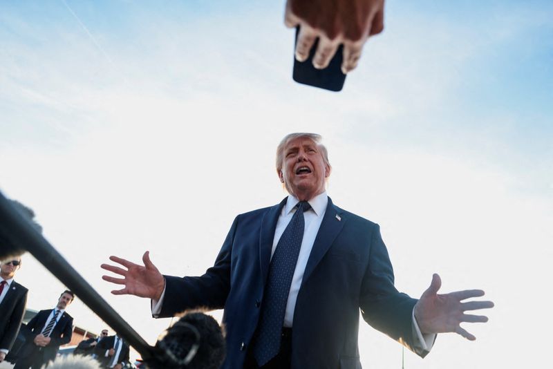 U.S. President Donald Trump speaks to the media upon arrival at Paris Orly airport, following the G7 Summit, in Orly, France, June 17, 2026. REUTERS/Evelyn Hockstein