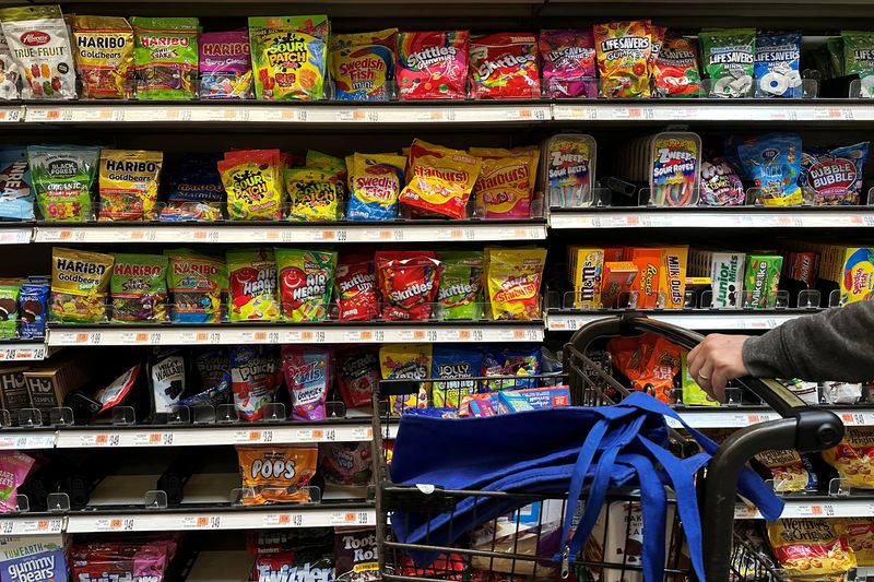 Candy is displayed for sale, as U.S. Health and Human Services (HHS) Secretary Robert F. Kennedy, Jr., along with FDA Commissioner Marty Makary, announce the FDA's intent to remove from the U.S. food supply "petroleum-based synthetic" food dyes, which are present in numerous foods such as breakfast cereals, candy, snacks, and beverages, at a grocery store in Medford, Massachusetts, U.S., April 22, 2025.   REUTERS/Brian Snyder
