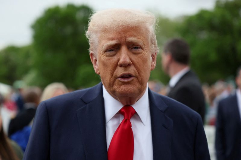 U.S. President Donald Trump attends the annual White House Easter Egg Roll, on the South Lawn of the White House in Washington, D.C., U.S., April 21, 2025. REUTERS/Leah Millis