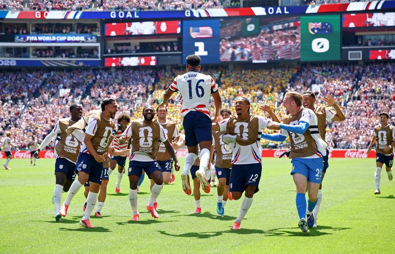 FILE PHOTO: Soccer Football - FIFA World Cup 2026 - Group D - United States v Australia - Seattle Stadium, Seattle, Washington, U.S. - June 19, 2026 Alex Freeman of the U.S. celebrates scoring their second goal with teammates REUTERS/Albert Gea/File Photo