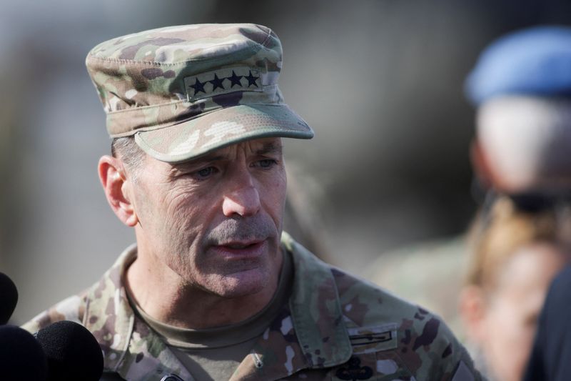 U.S. Army Europe and Africa Commanding General, Gen. Christopher Donahue, chats with press representatives during a visit at MK Airbase, in Mihail Kogalniceanu, Constanta county, Romania, November 25, 2025. Inquam Photos/George Calin via REUTERS