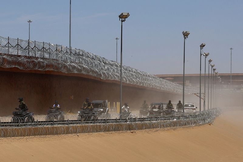 U.S. Border Patrol agents tour the El Paso, Texas, border with Mexico alongside Department of Homeland Security Secretary Kristi Noem as U.S. President Donald Trump completes his first 100 days in office, seen from Ciudad Juarez, Mexico April 28, 2025. REUTERS/Jose Luis Gonzalez