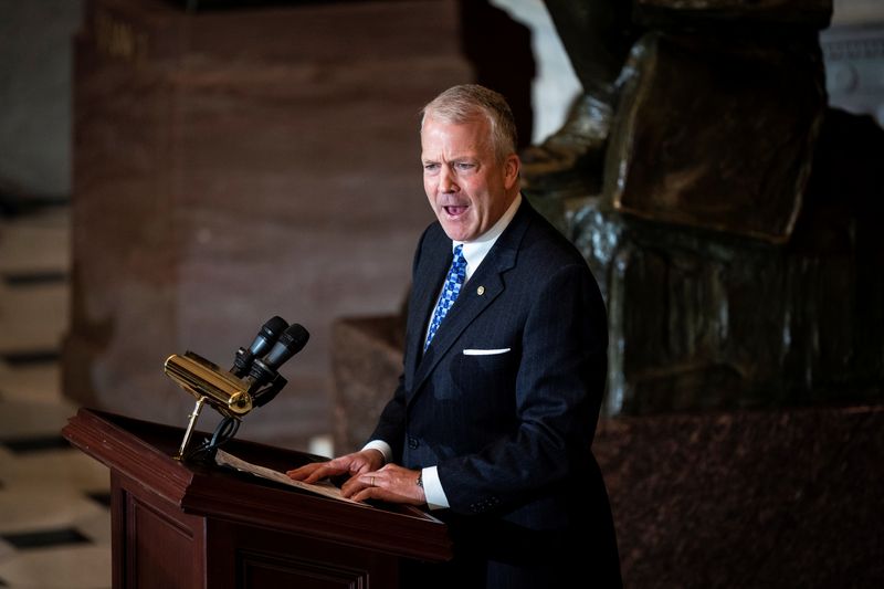 Sen. Dan Sullivan (R-AK) speaks during a ceremony for the late Rep. Don Young, R-Alaska, as he lies in state in Statuary Hall on Capitol Hill in Washington, U.S., March 29, 2022. Jabin Botsford/Pool via REUTERS