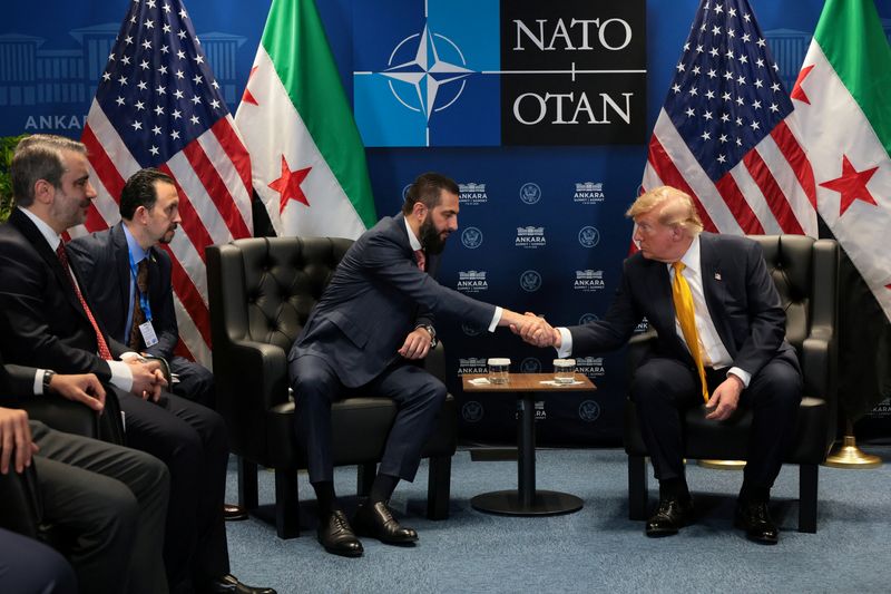 U.S. President Donald Trump shakes hands with Syrian President Ahmed al-Sharaa during a bilateral meeting alongside the NATO leaders summit at the Bestepe Presidential Compound in Ankara, Turkey, July 8, 2026. REUTERS/Jonathan Ernst