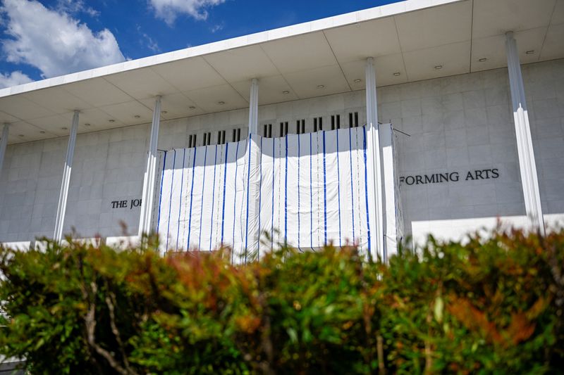 A tarp covers the facade of the John F. Kennedy Memorial Center for the Performing Arts, following a federal judge’s order to remove U.S. President Donald Trump's name from the institution, in Washington, D.C., U.S., June 20, 2026. REUTERS/Daniel Heuer
