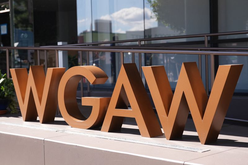 The Writers Guild of America West logo stands as Writers Guild staff take part in a strike outside the WGAW headquarters in Hollywood, Los Angeles, California, U.S., February 18, 2026. REUTERS/Arafat Barbakh