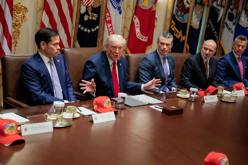 U.S. President Donald Trump speaks next to Secretary of State Marco Rubio, Defense Secretary Pete Hegseth, Commerce Secretary Howard Lutnick and Transport Secretary Sean Duffy during a cabinet meeting in the Cabinet Room at the White House, in Washington, D.C., U.S., May 27, 2026. REUTERS/Evan Vucci