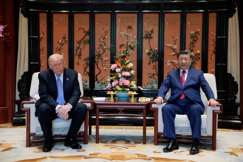 FILE PHOTO: Chinese President Xi Jinping and U.S. President Donald Trump attend a meeting on the sidelines of their visit to the Zhongnanhai Garden in Beijing, China, May 15, 2026. REUTERS/Evan Vucci/Pool/File Photo