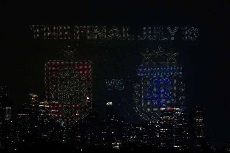 Jul 15, 2026; Jersey City, New Jersey, USA; A general view of a drone show above Liberty State Park with the New York City skyline in the background ahead of the FIFA World Cup 2026 Final between Spain and Argentina. Mandatory Credit: Vincent Carchietta-Imagn Images