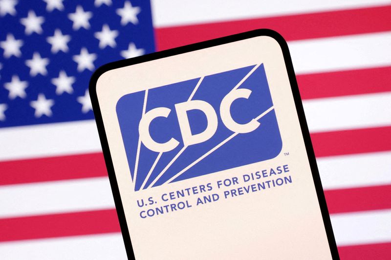 FILE PHOTO: The U.S. Centers for Disease Control and Prevention's logo and a U.S. flag are seen in this illustration created on April 23, 2025. REUTERS/Dado Ruvic/Illustration/File Photo