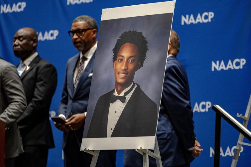 A photo of Nolan Wells is displayed on stage where Ben Crump, a lawyer for the family of Nolan Wells announces the results of an independent autopsy of the young Black man whose body was found on an island off the coast of Mississippi after he travelled there over the Fourth of July weekend, during a press conference at the NAACP Convention in Chicago, Illinois, U.S., July 22, 2026.  REUTERS/Jim Vondruska