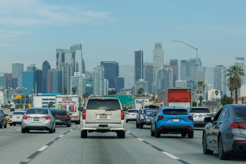 FILE PHOTO: Traffic makes its way into downtown Los Angeles, California, U.S., February 24,  2026.  REUTERS/Mike Blake/File Photo