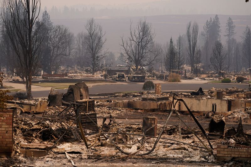 A view of a burned neighbourhood in the Old Trails Fire, in Spokane, Washington, U.S., August 3, 2026. REUTERS/David Ryder