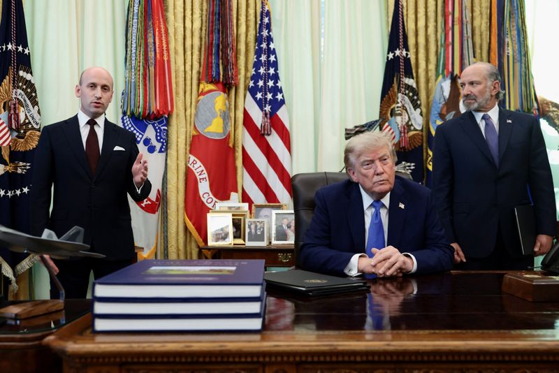 White House Deputy Chief of Staff Stephen Miller speaks while U.S. President Donald Trump and U.S. Secretary of Commerce Howard Lutnick listen during an event to sign executive orders related to birthright citizenship and the polysilicon industry, in the Oval Office at the White House in Washington, D.C., U.S., August 6, 2026. REUTERS/Evelyn Hockstein