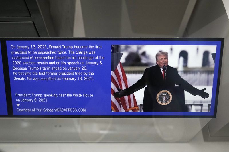 A display of a photo of U.S. President Donald Trump related to his second impeachment at the Smithsonian National Museum of American History in Washington, D.C., U.S., July 25, 2026. REUTERS/Ken Cedeno