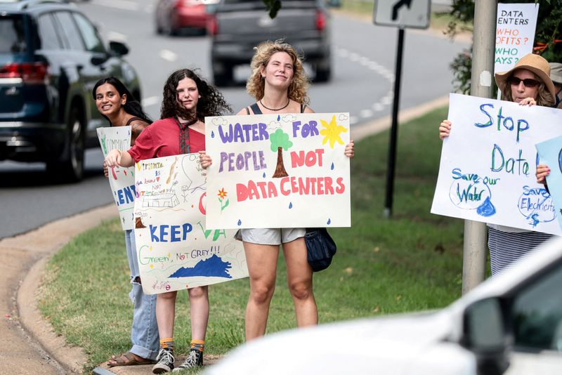 FILE PHOTO: Demonstrators participate in a nationwide protest against data centers, in Fredericksburg, Virginia, U.S., July 18, 2026. REUTERS/Evelyn Hockstein/File Photo