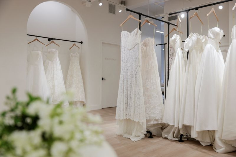 Wedding dresses are displayed at the Jenny Yoo bridal boutique in New York City, U.S., August 6, 2026. REUTERS/Jeenah Moon