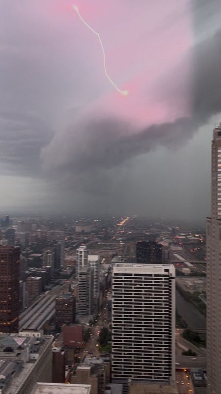 Lightning strikes on a stormy day in Chicago, Illinois, U.S., August 11, 2026, in this picture obtained from social media video. Nick Wojcicki/via REUTERS
