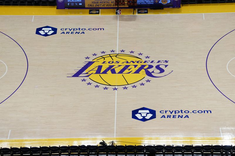 Mar 5, 2026; Los Angeles, California, USA; The Los Angeles Lakers logo at midcourt at the Crypto.com Arena. Mandatory Credit: Kirby Lee-Imagn Images