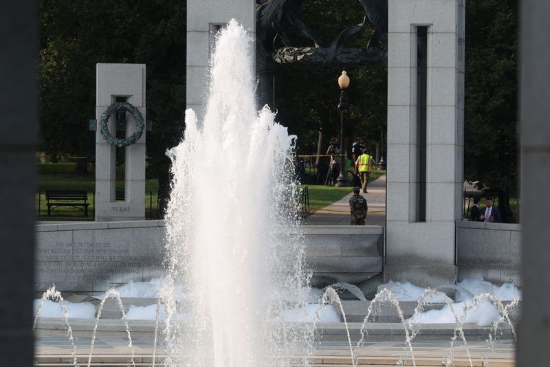 Soap at the pool of the National World War II Memorial after it was reportedly vandalized with soap and graffiti in Washington, D.C., U.S., August 13, 2026. REUTERS/Kylie Cooper