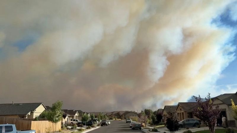 Smoke rises from Hawk fire in Reno, Nevada, U.S., August 22, 2026 in this screengrab taken from social media video. Simon Jowitt/via REUTERS