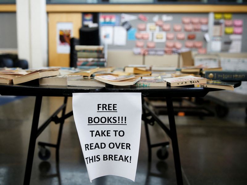 FILE PHOTO: A table of free books for local children in Seattle, Washington, U.S. March 17, 2020. REUTERS/Lindsey Wasson/File Photo