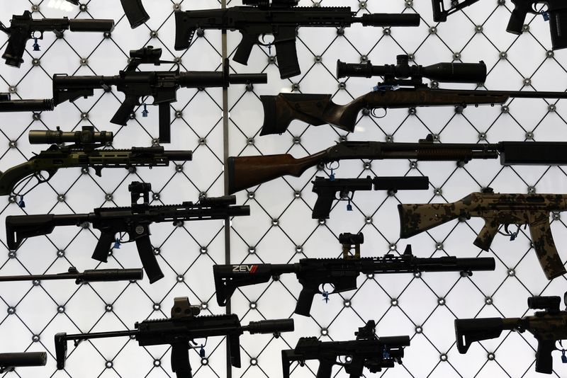 Guns are displayed at a booth during the National Rifle Association (NRA) annual meeting in Atlanta, Georgia, U.S. April 27, 2025. REUTERS/Jeenah Moon/File Photo