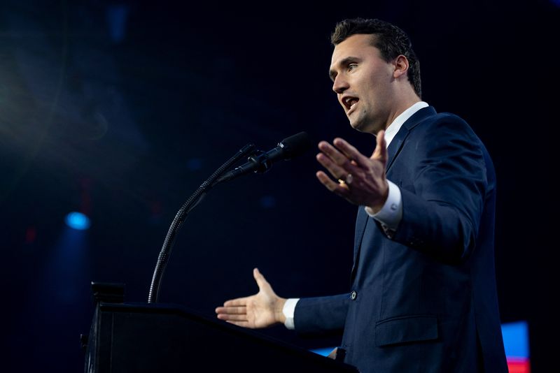 FILE PHOTO: Charlie Kirk, Turning Point USA founder, speaks ahead of a visit by U.S. President-elect Donald Trump during the AmericaFest 2024 conference sponsored by the conservative group in Phoenix, Arizona, U.S. December 22, 2024.  REUTERS/Cheney Orr/ File Photo