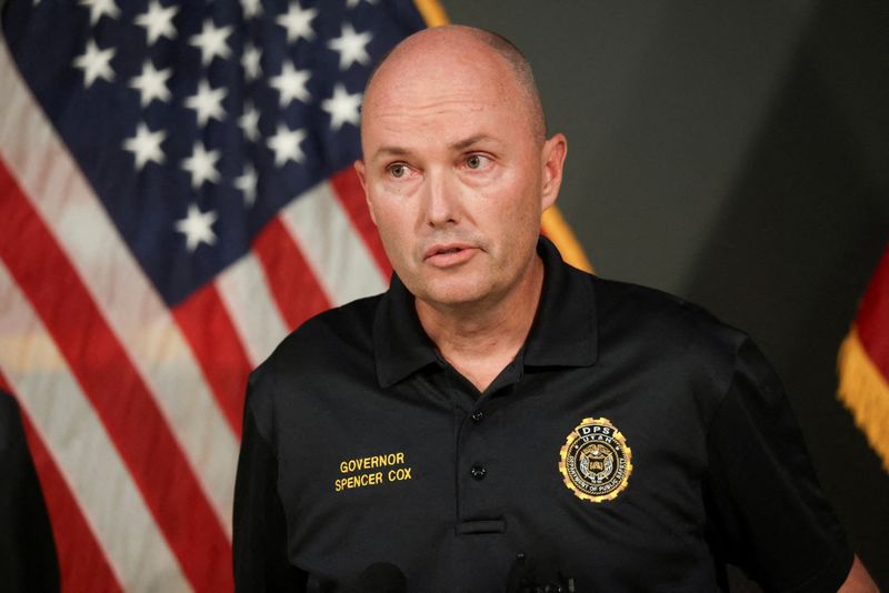 FILE PHOTO: Utah Governor Spencer Cox speaks at a press conference after U.S. right-wing activist, commentator, Charlie Kirk, an ally of U.S. President Donald Trump, was fatally shot during an event at Utah Valley University, in Orem, Utah, U.S. September 10, 2025.  REUTERS/Jim Urquhart/File Photo