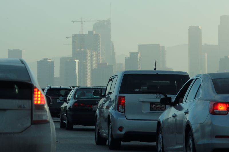 FILE PHOTO: Commuters navigate early morning traffic as they drive towards downtown in Los Angeles, California, U.S., July 22, 2019.    REUTERS/Mike Blake/ File Photo