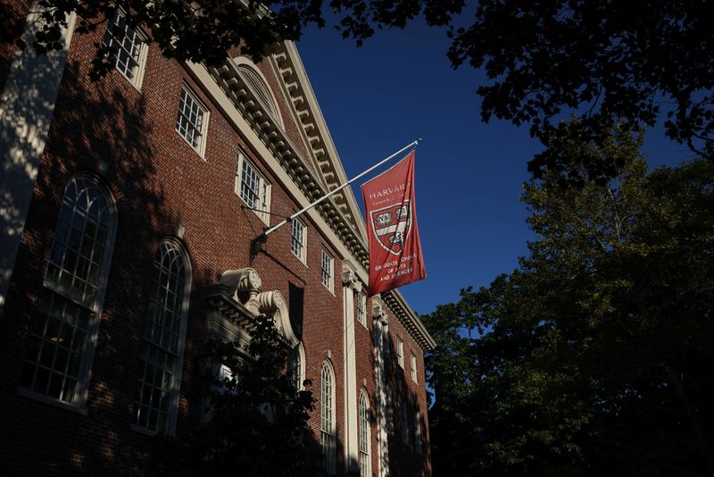 FILE PHOTO: A flag hangs on campus at Harvard University in Cambridge, Massachusetts, U.S., September 4, 2025. REUTERS/Shannon Stapleton/ File Photo