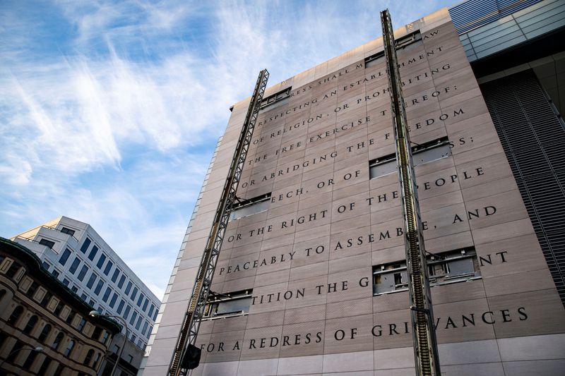 A wall stating the First Amendment of the U.S. Constitution is seen on the Newseum, in Washington, U.S., February 21, 2021. REUTERS/Al Drago/File Photo