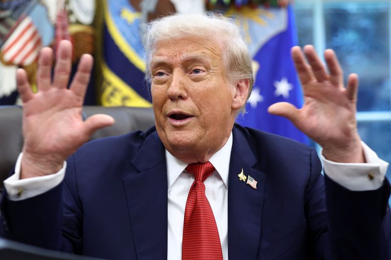 U.S. President Donald Trump gestures as he takes questions from the press after signing an executive order on a deal that would divest TikTok's U.S. operations from ByteDance from its Chinese owner ByteDance, at the White House in Washington, D.C., U.S., September 25, 2025. REUTERS/Kevin Lamarque