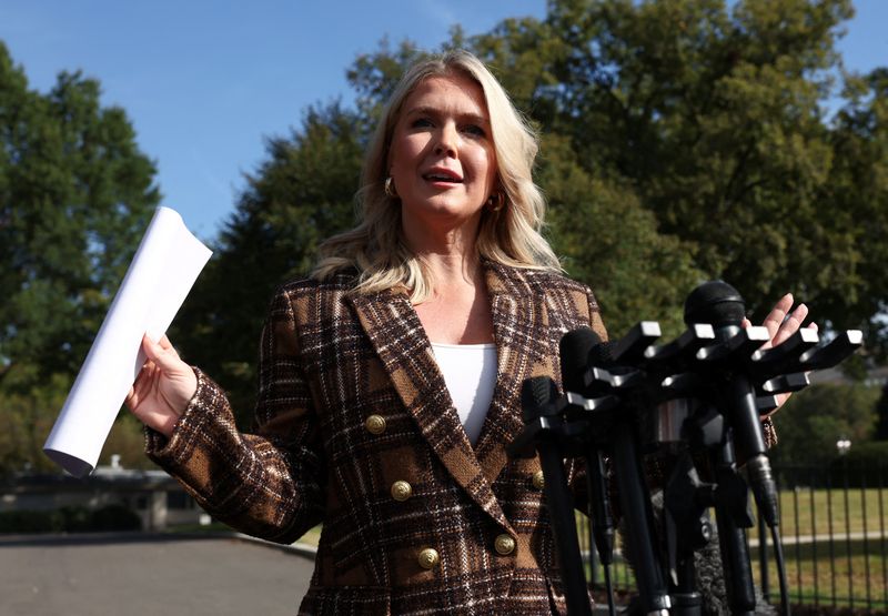 White House press secretary Karoline Leavitt speaks to reporters outside the West Wing of the White House in Washington, D.C., U.S., October 2, 2025. REUTERS/Kevin Lamarque