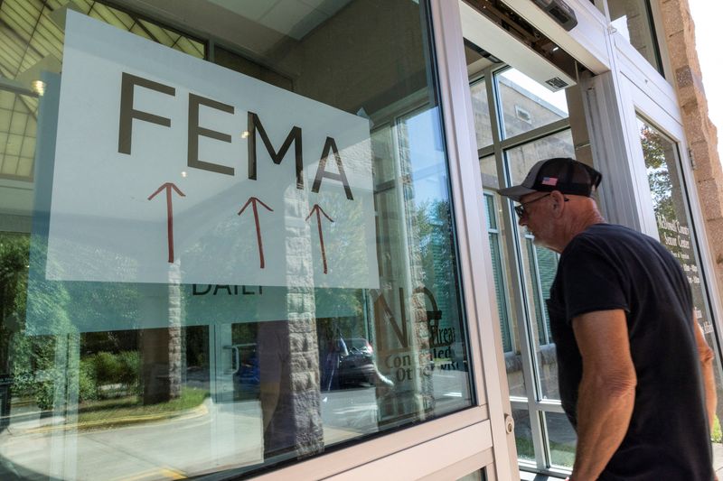 A resident enters a FEMA's improvised station to attend claims by local residents affected by floods following the passing of Hurricane Helene, in Marion, North Carolina, U.S., October 5, 2024. REUTERS/Eduardo Munoz