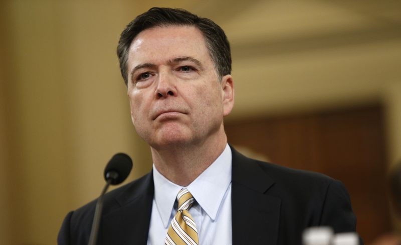 FBI Director James Comey waits before testifying at a House Intelligence Committee hearing into alleged Russian meddling in the 2016 U.S. election, on Capitol Hill in Washington, U.S., March 20, 2017. REUTERS/Joshua Roberts