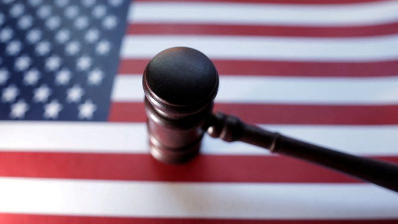 FILE PHOTO: U.S. flag and judge's gavel are seen in this illustration created on August 6, 2024. REUTERS/Dado Ruvic/Illustration/File Photo