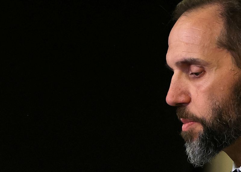 U.S. Special Counsel Jack Smith looks on as he makes a statement to reporters after a grand jury returned an indictment of former U.S. President Donald Trump in the special counsel's investigation of efforts to overturn his 2020 election defeat, at Smith's offices in Washington, U.S. August 1, 2023. REUTERS/Kevin Wurm